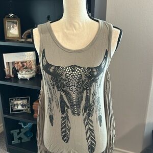 Olive green, stretchy material with fringe sides